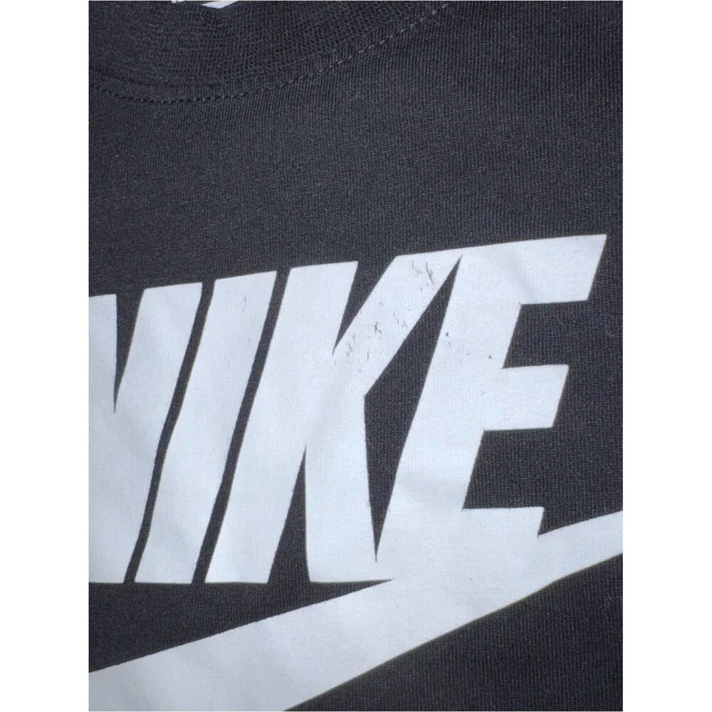 Nike size 5 Black with White Logo tee shirt